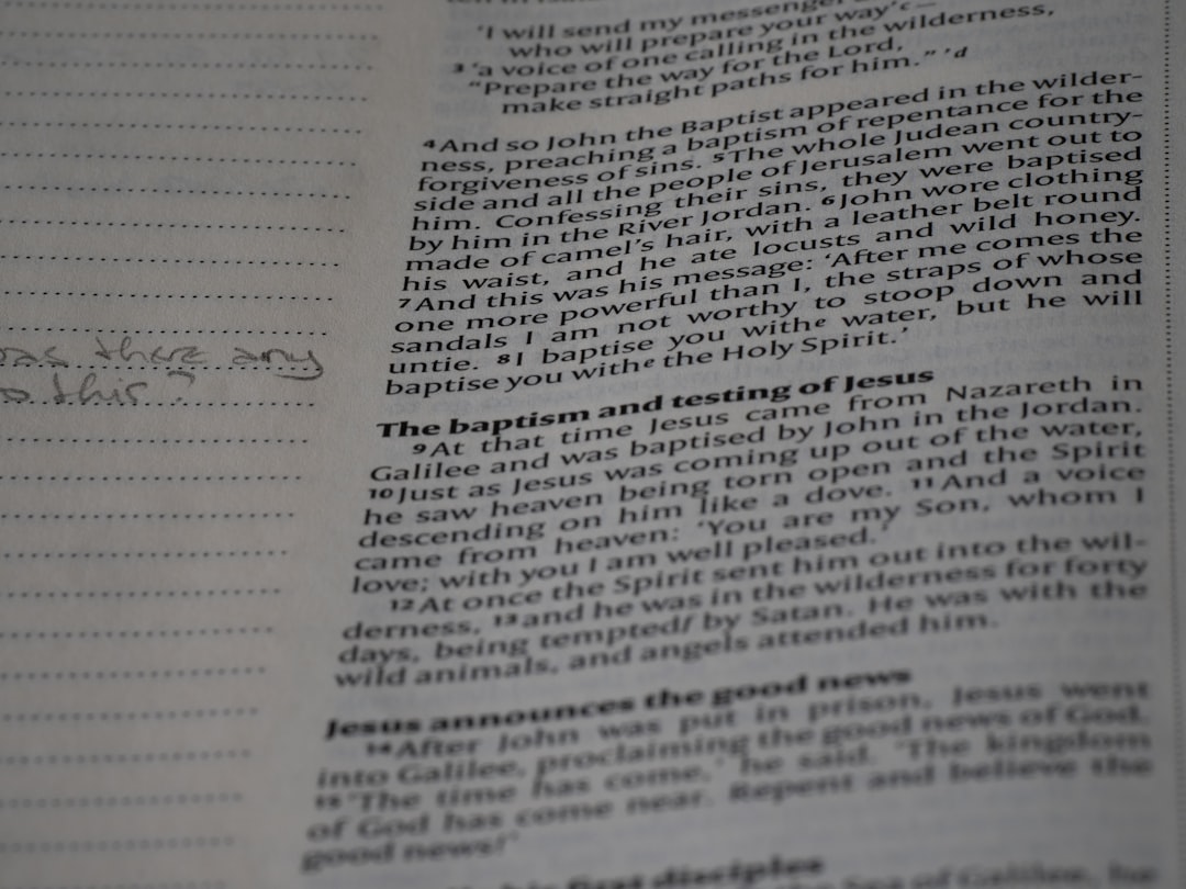a close up of a book with writing on it